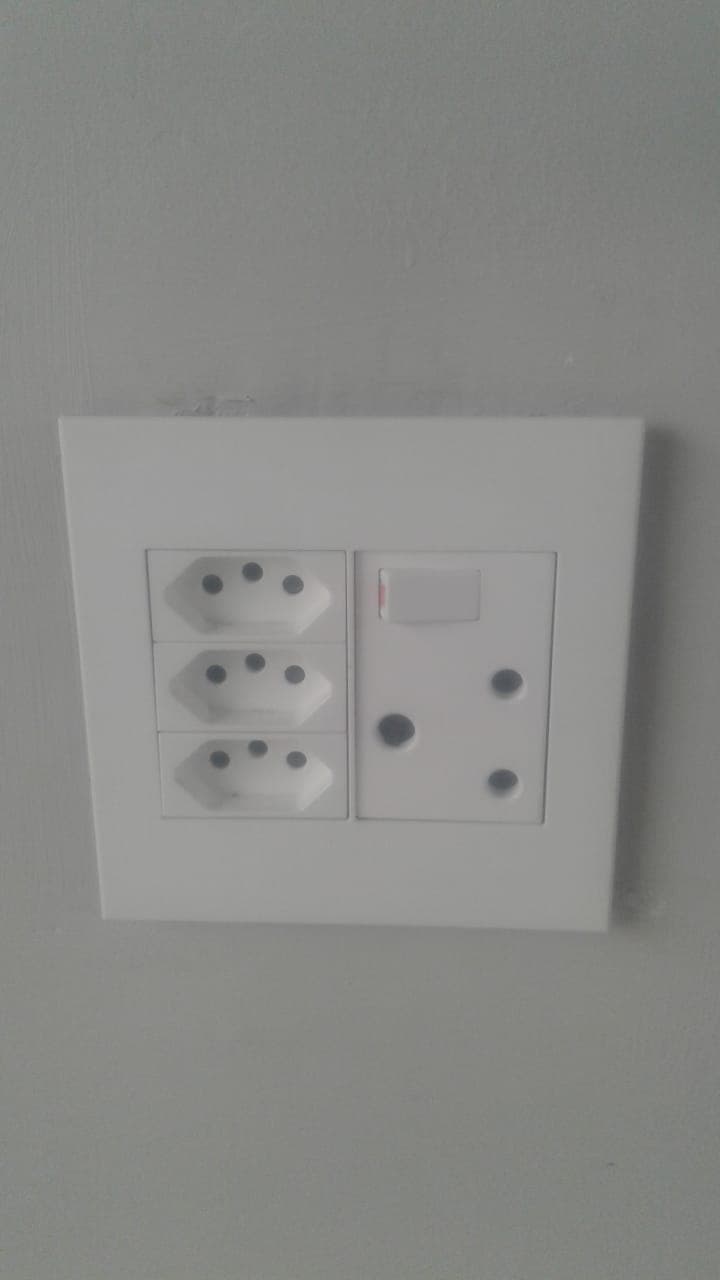 White South African wall socket plate with Type N and Type M outlets